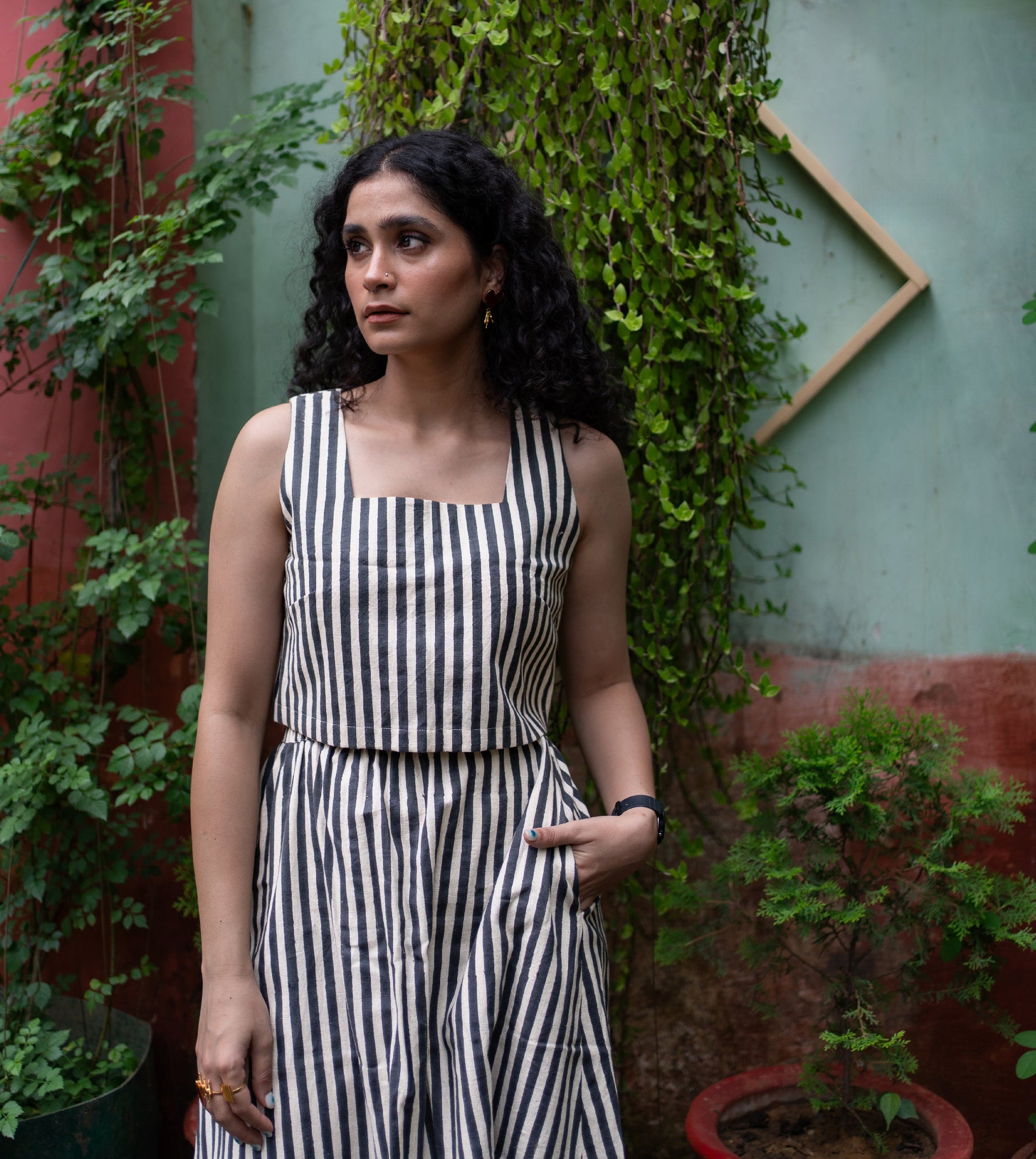 Stripes Yoko Skirt in Black ? a paneled, long sustainable cotton skirt with an elastic waistband and pockets. Made from organic, hand-loomed 'kala' cotton in India.