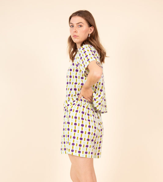 Ren Shorts Green Purple | Harkoi Studio - Make a bold statement with the Ren Shorts in green & purple. Keywords: sustainable shorts, eco-friendly fashion, Ren Shorts, green & purple shorts, ethical clothing.