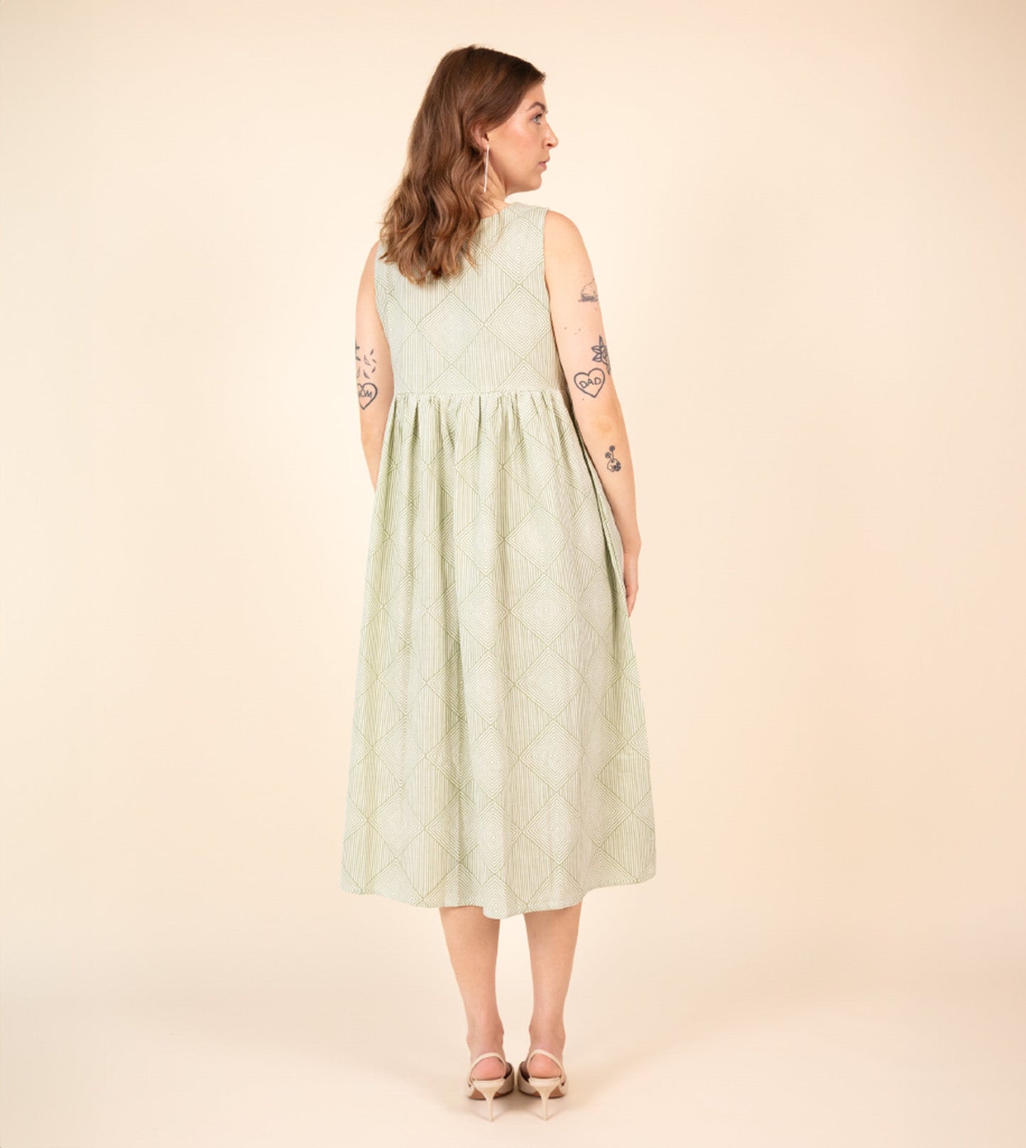 Suki Dress Green | Harkoi Studio - Your ideal companion for both casual and formal settings, the Suki Dress, a sustainable- crafted with precision and care. Keywords: suki, dress, green, sustainable green, eco-friendly fashion.