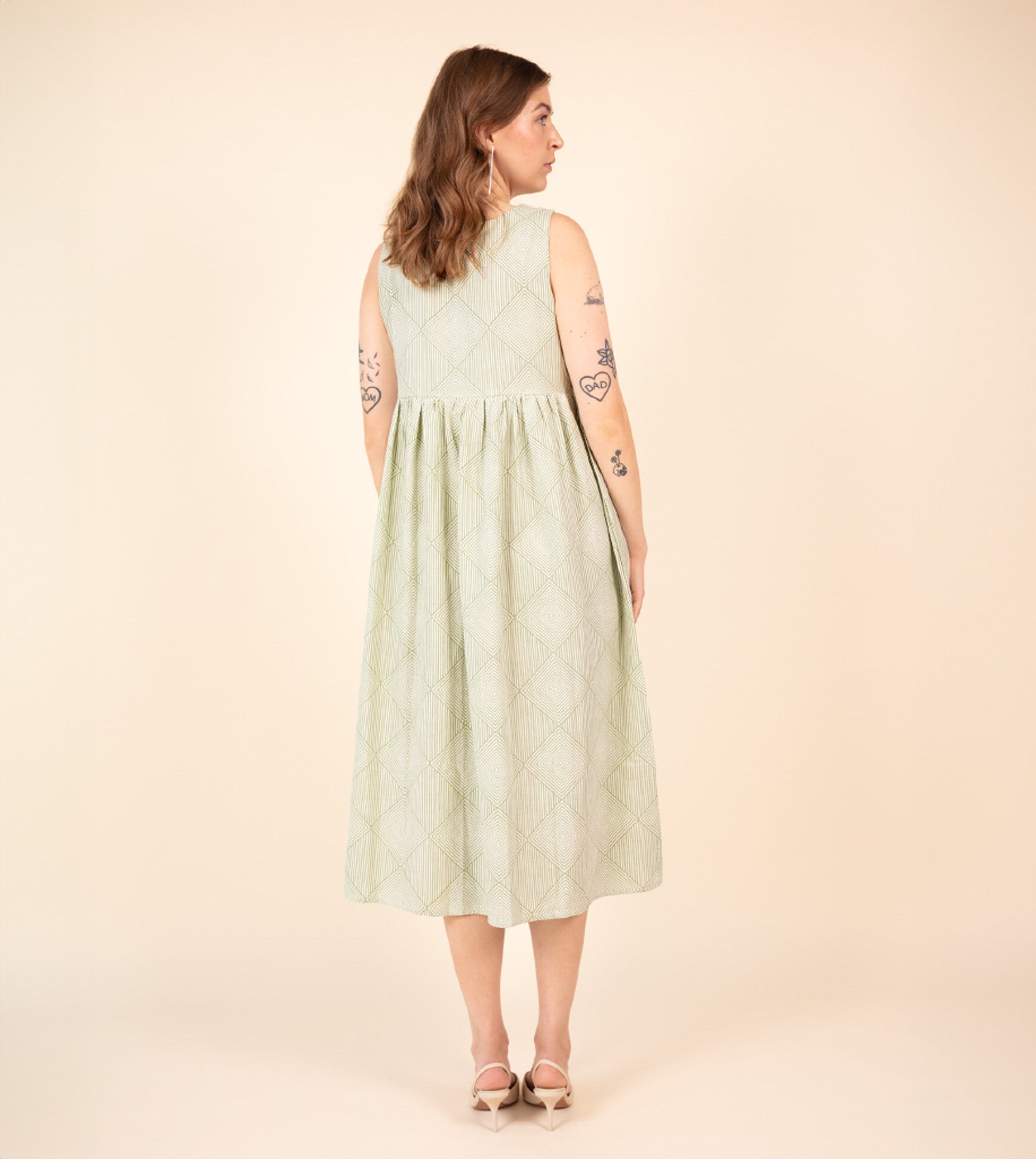 Suki Dress Green | Harkoi Studio - Your ideal companion for both casual and formal settings, the Suki Dress, a sustainable- crafted with precision and care. Keywords: suki, dress, green, sustainable green, eco-friendly fashion.