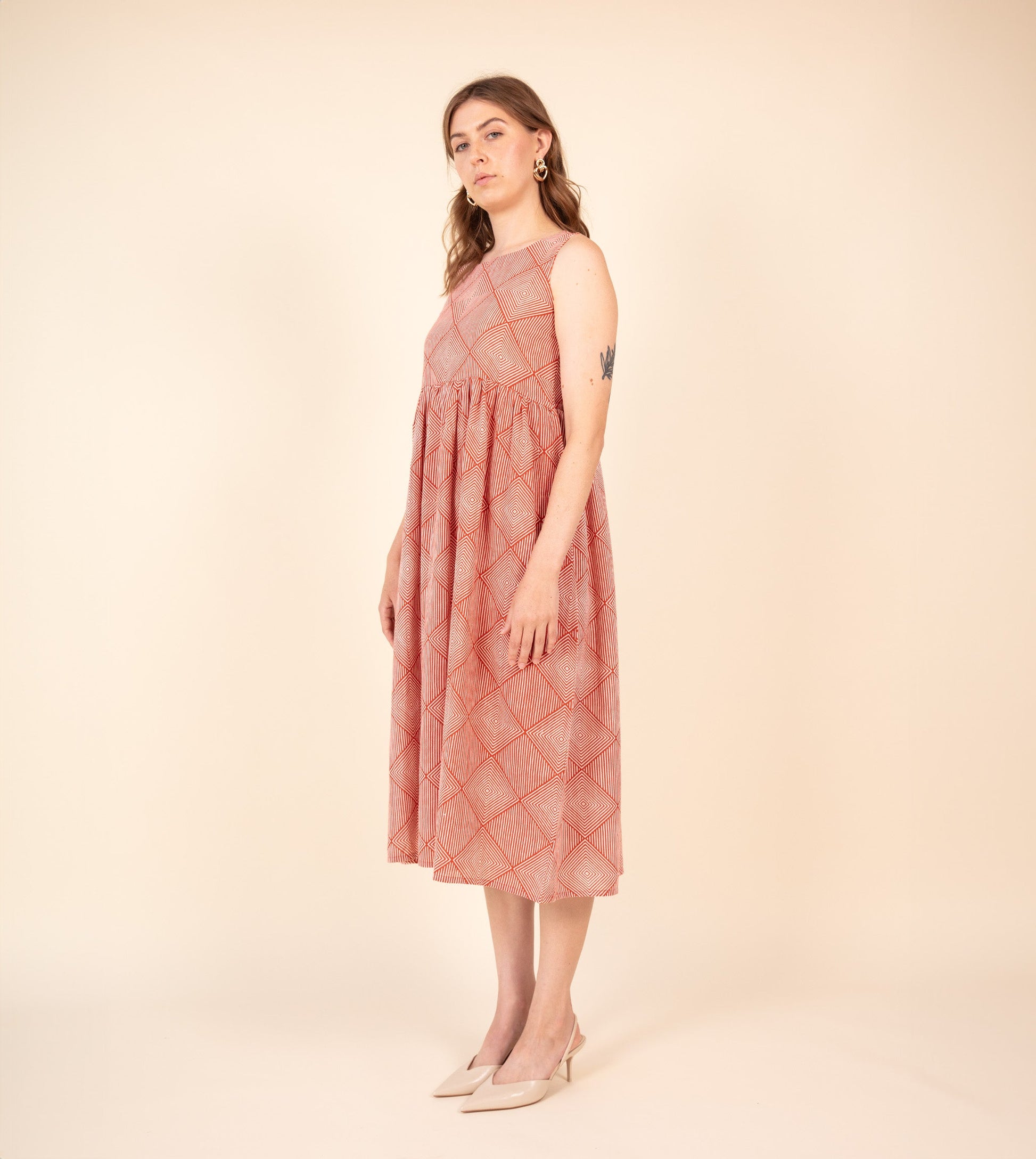 Suki Dress Orange | Harkoi Studio - Brighten your wardrobe with the Suki Dress in vibrant orange. Keywords: sustainable dress, eco-friendly fashion, Suki Dress, orange dress, ethical clothing.