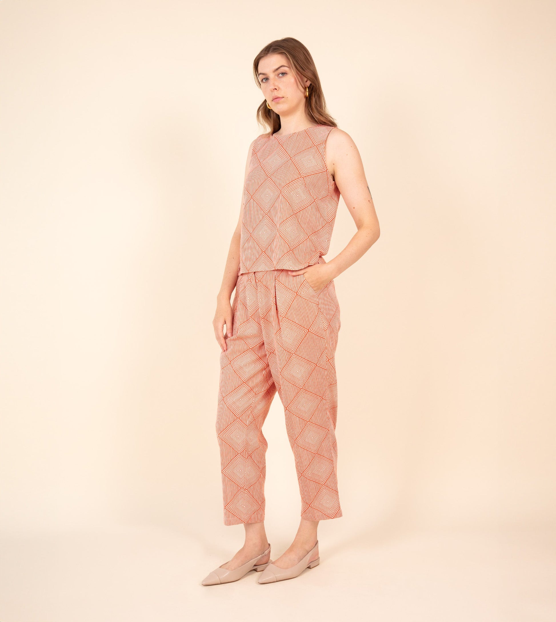 Haru Pants Orange - Harkoi Studio - Brighten your wardrobe with the Haru Pants in bold orange. Keywords: sustainable pants, eco-friendly fashion, comfortable trousers, casual wear