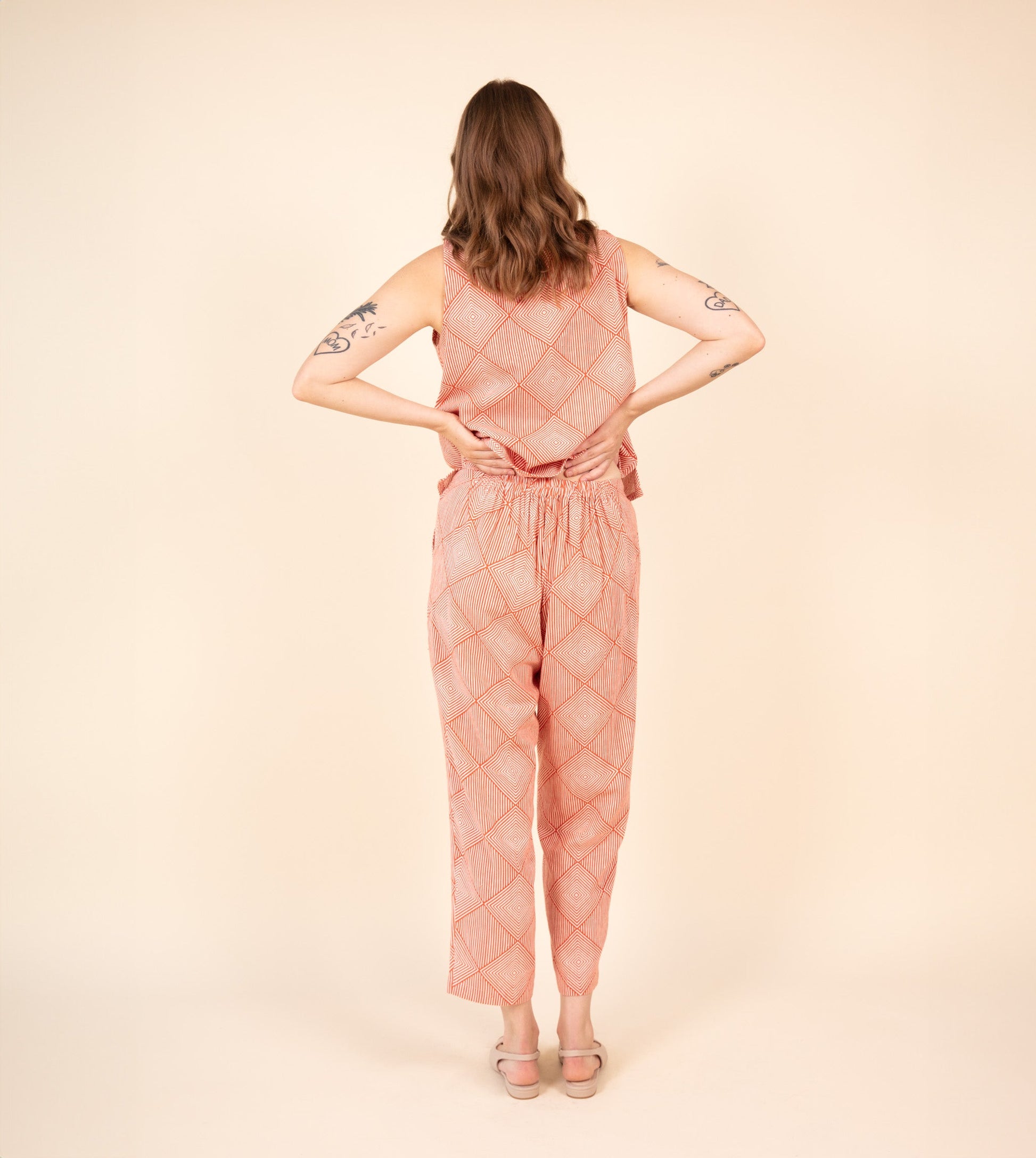 Haru Pants Orange - Harkoi Studio - Brighten your wardrobe with the Haru Pants in bold orange. Keywords: sustainable pants, eco-friendly fashion, comfortable trousers, casual wear