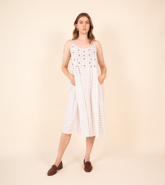 Neusa Dress Woven Check Embroidered - Harkoi Studio - Discover the Neusa Dress in woven check with delicate embroidery. Keywords: sustainable dress, eco-friendly clothing, Neusa Dress, woven check dress, embroidered dress, ethical fashion.