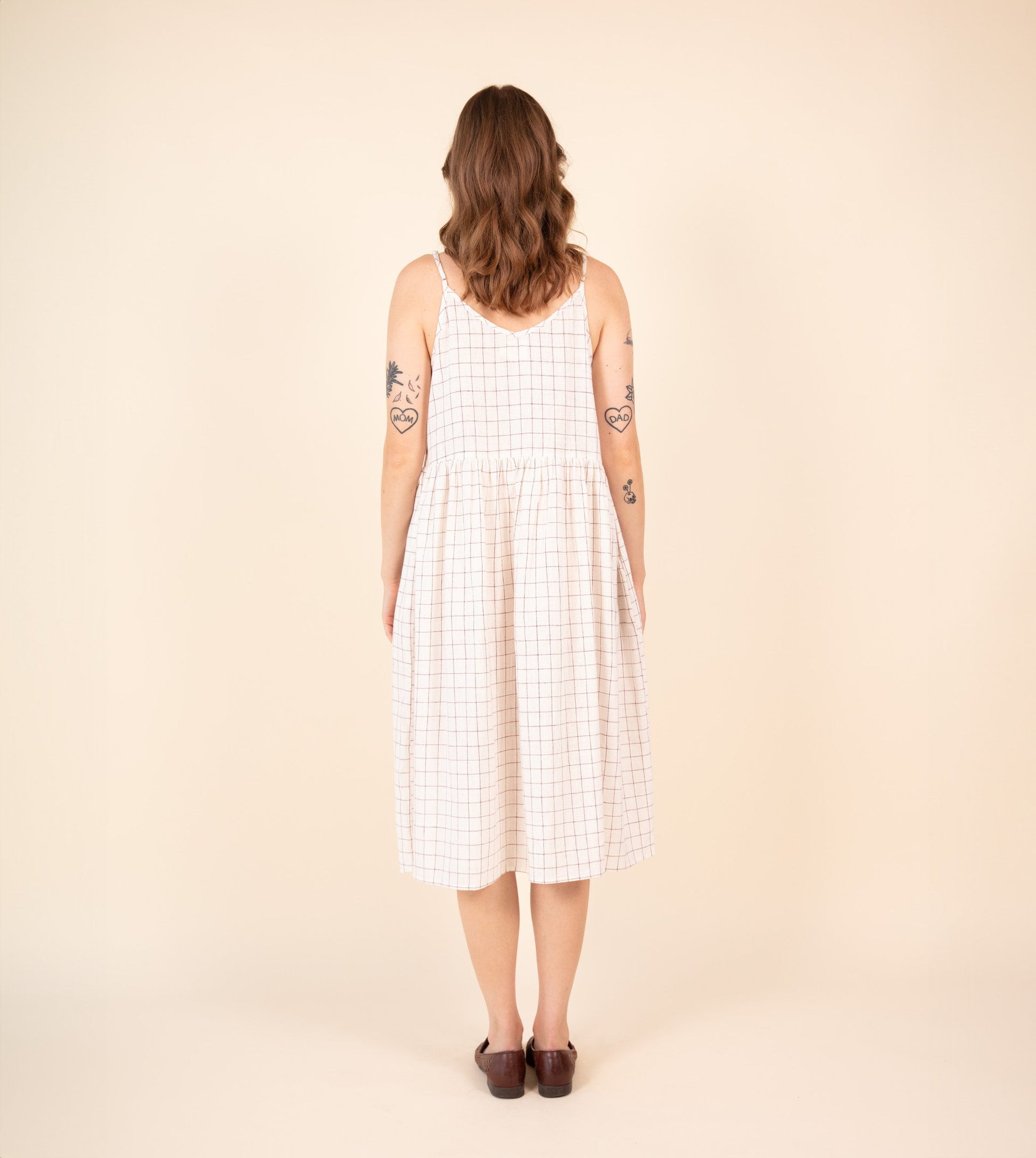 Neusa Dress Woven Check Embroidered - Harkoi Studio - Discover the Neusa Dress in woven check with delicate embroidery. Keywords: sustainable dress, eco-friendly clothing, Neusa Dress, woven check dress, embroidered dress, ethical fashion.