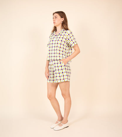 Ren Shorts Green Purple | Harkoi Studio - Make a bold statement with the Ren Shorts in green & purple. Keywords: sustainable shorts, eco-friendly fashion, Ren Shorts, green & purple shorts, ethical clothing.
