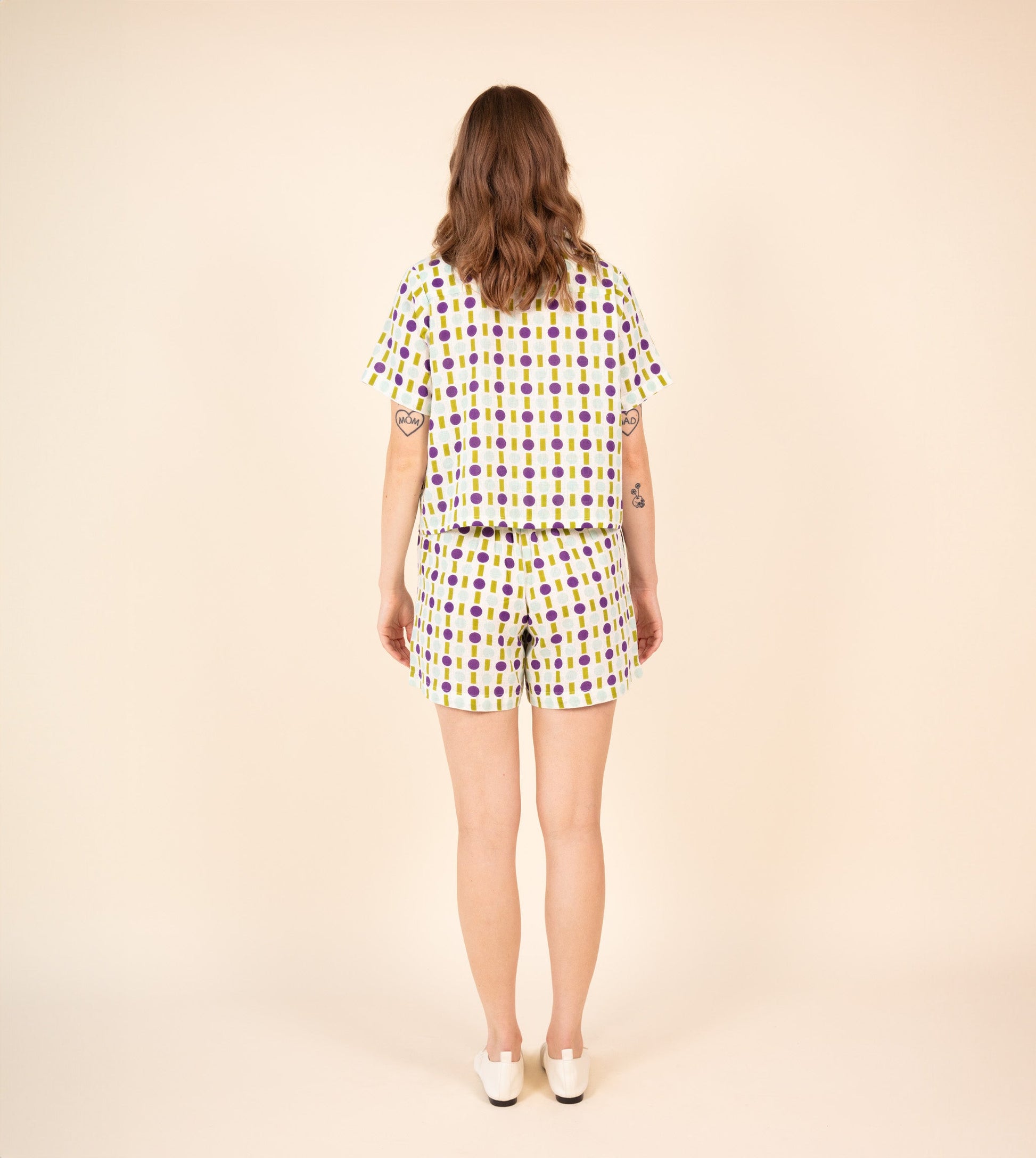 Ren Shorts Green Purple | Harkoi Studio - Make a bold statement with the Ren Shorts in green & purple. Keywords: sustainable shorts, eco-friendly fashion, Ren Shorts, green & purple shorts, ethical clothing.