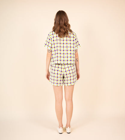 Ren Shorts Green Purple | Harkoi Studio - Make a bold statement with the Ren Shorts in green & purple. Keywords: sustainable shorts, eco-friendly fashion, Ren Shorts, green & purple shorts, ethical clothing.