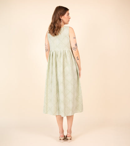 Suki Dress Green | Harkoi Studio - Your ideal companion for both casual and formal settings, the Suki Dress, a sustainable- crafted with precision and care. Keywords: suki, dress, green, sustainable green, eco-friendly fashion.