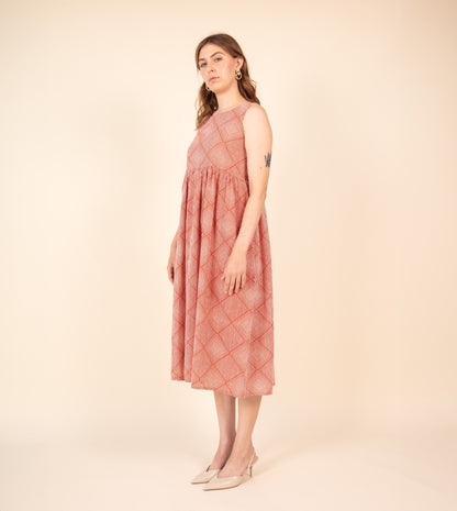 Suki Dress Orange | Harkoi Studio - Brighten your wardrobe with the Suki Dress in vibrant orange. Keywords: sustainable dress, eco-friendly fashion, Suki Dress, orange dress, ethical clothing.