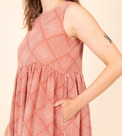 Suki Dress Orange | Harkoi Studio - Brighten your wardrobe with the Suki Dress in vibrant orange. Keywords: sustainable dress, eco-friendly fashion, Suki Dress, orange dress, ethical clothing.