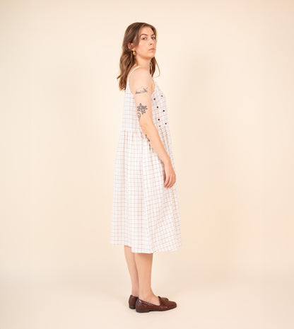 Neusa Dress Woven Check Embroidered - Harkoi Studio - Discover the Neusa Dress in woven check with delicate embroidery. Keywords: sustainable dress, eco-friendly clothing, Neusa Dress, woven check dress, embroidered dress, ethical fashion.
