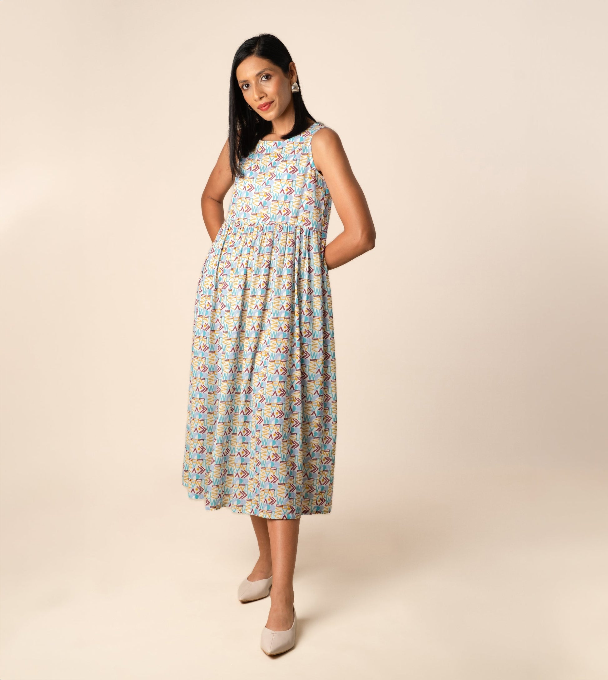 Suki Dress Girard | Harkoi Studio - Turn heads with the Suki Dress in the bold Girard pattern. Keywords: sustainable dress, eco-friendly fashion, Suki Dress, Girard-patterned dress, ethical clothing.