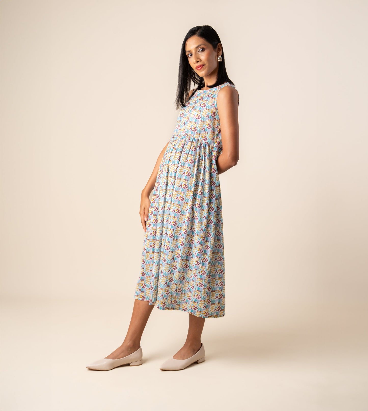 Suki Dress Girard | Harkoi Studio - Turn heads with the Suki Dress in the bold Girard pattern. Keywords: sustainable dress, eco-friendly fashion, Suki Dress, Girard-patterned dress, ethical clothing.
