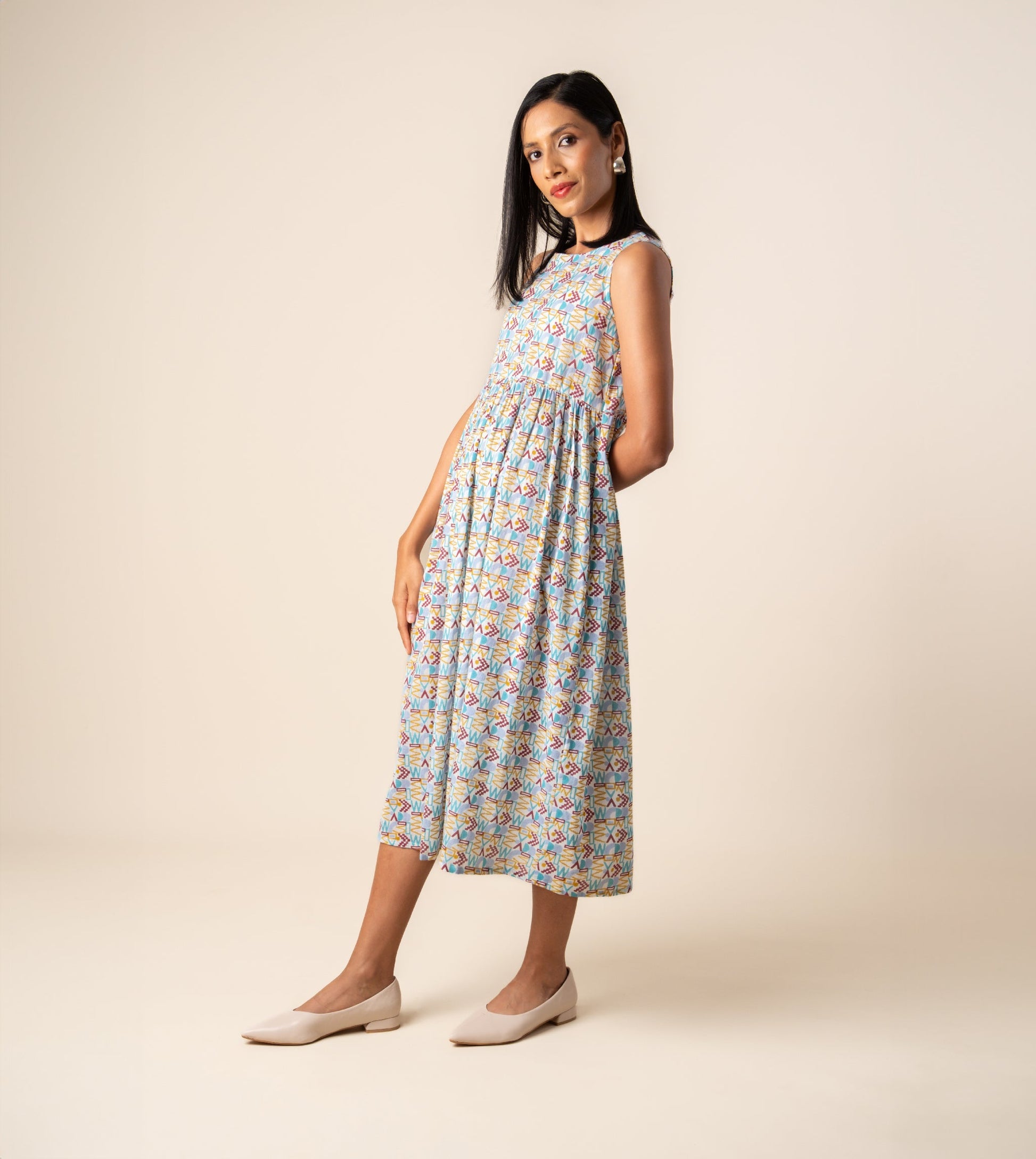 Suki Dress Girard | Harkoi Studio - Turn heads with the Suki Dress in the bold Girard pattern. Keywords: sustainable dress, eco-friendly fashion, Suki Dress, Girard-patterned dress, ethical clothing.